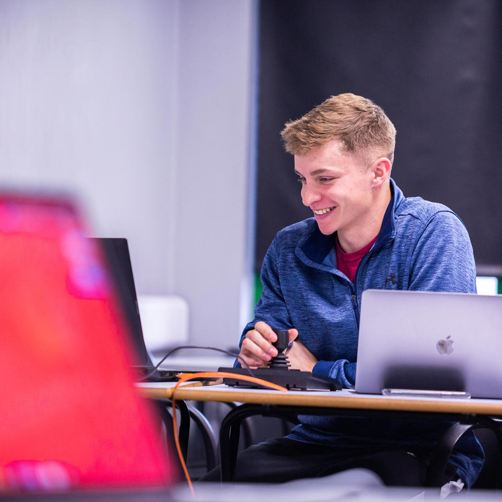 Sport Student Working On Laptop