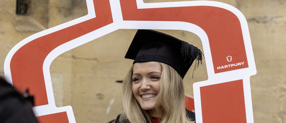 Graduate Holding Acorn