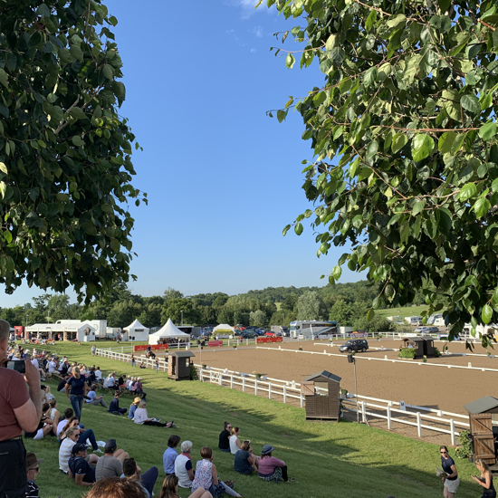 Spectators On Grass Bank At Hartpury