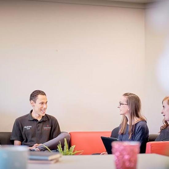 Group of students chatting in Hartpury accommodation