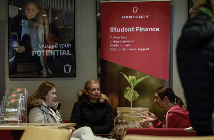 Visitors Talking To Finance
