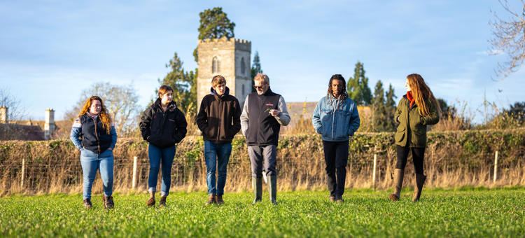 Students And Lecturer On Crop Walk