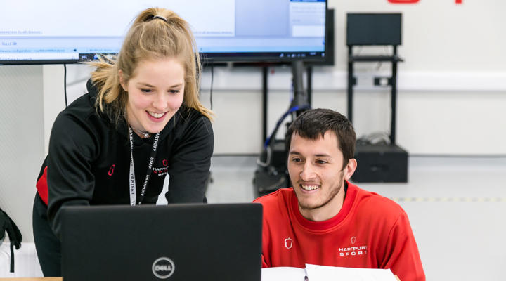 Sports Students Working On Laptop