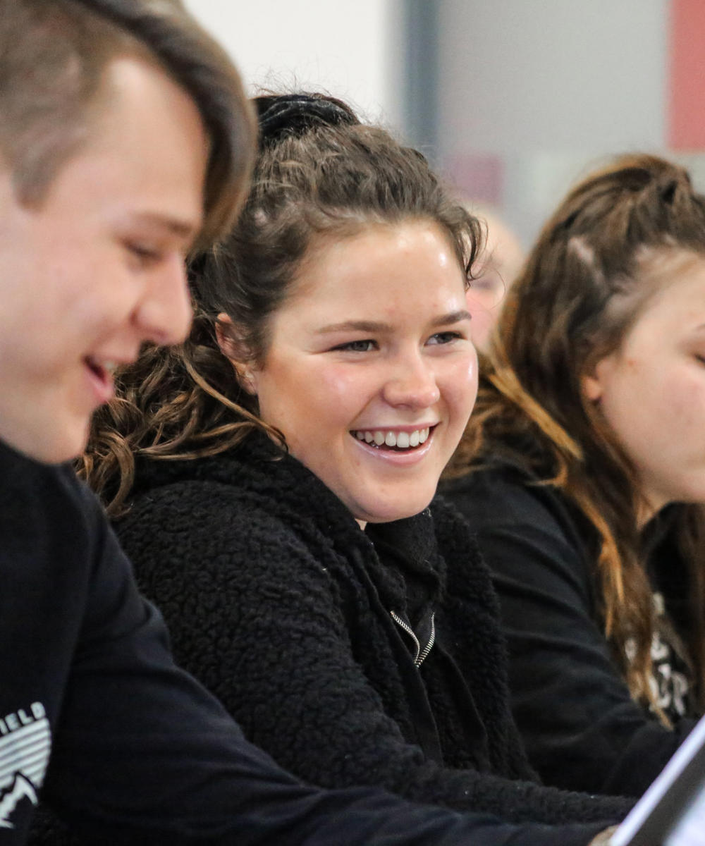 Image of students smiling in a lesson