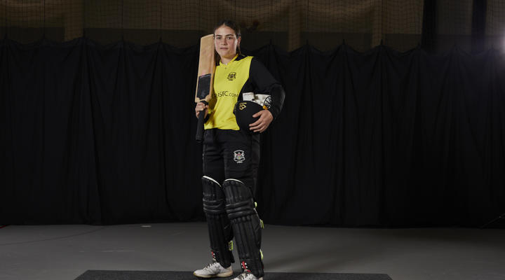Player In Cricket Gear
