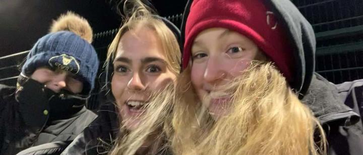 Alana and friends watching sport